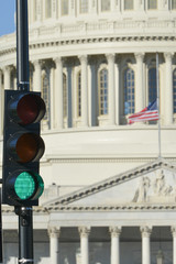 Green traffic light in front of the U.S. Capitol Building represents an positive decision