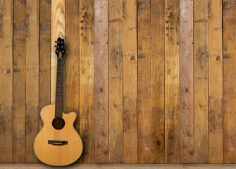 Acoustic guitar on wood floors