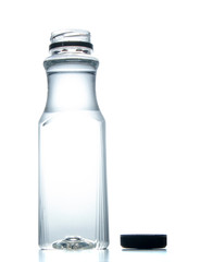 Plastic water bottle with black screw cap on a white background