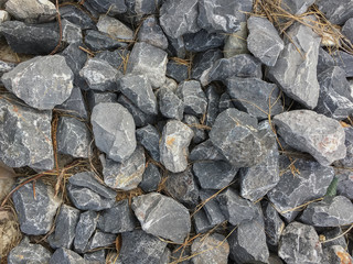  group of textured stone piles on the ground