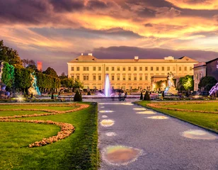 Deurstickers Amazing evening view of Mirabell Palace, Salzburg, Austria, Europe. Superb spring scene of Mirabell Garden. Traveling concept background.. © Andrew Mayovskyy