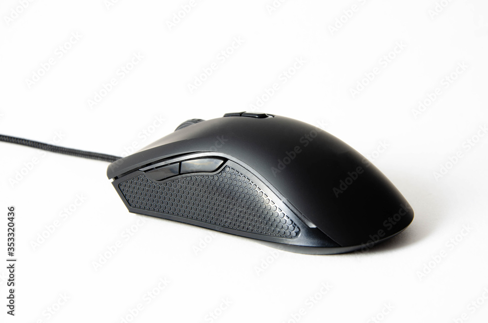 Poster black gaming mouse with side extra keys and a matte finish on white background. mouse view from the 