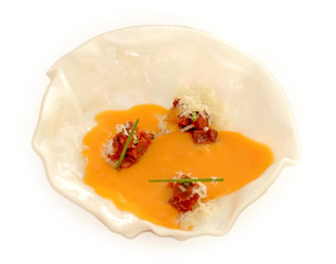 .Carrot soup with cheese and marinated meat