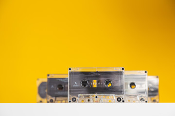 Obraz premium audio cassettes on a yellow background