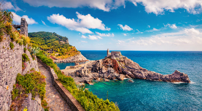 Impressive summer view of Saint Peter Church in Portovenere town. Picturesque morning seascape of Mediterranean sea, Liguria, province of La Spezia, Italy, Europe. Traveling concept background.