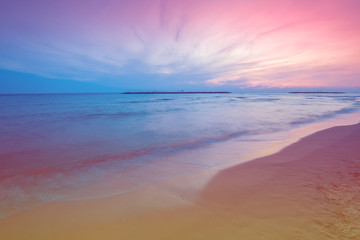 Early morning. Pink sunrise over the sea