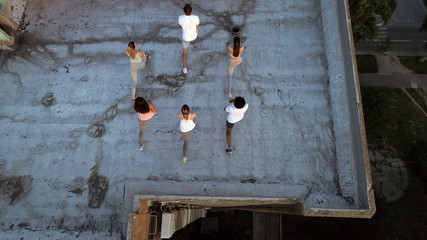 Fitness, sport, friendship and healthy lifestyle concept. Group of happy sporty people