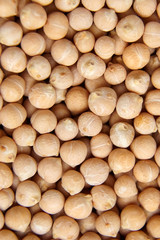 Chickpea seeds background, top view. Chick peas, or garbanzo beans