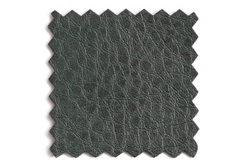 A sample of factory leather in dark green in macro cut on a machine tool. Structural, textured...