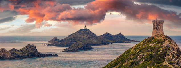 Panoramic summer view of popular tourist destination Torra di a Parata - 16th-century Genoese tower...