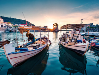 Fototapeta premium Adorable summer sunrise on Gulf of Corinth, Greece, Europe. Amazing morning scene of popular touristic destination - Nafpaktos port. Calm Ionian seascape. Traveling concept background.