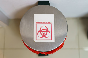 Close up bin for hazardous waste in hospital.