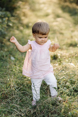 little girl playing in park