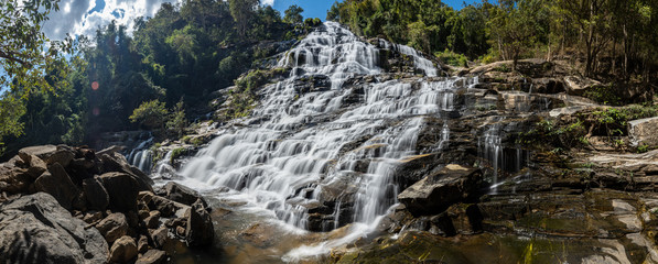 Beautiful Smooth Waterfall with blue sky