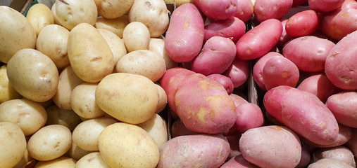 White and red potatoes in the market