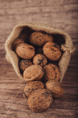 walnuts in burlap sack 