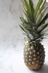 pineapple on the table © AMTM