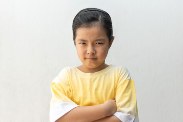 Unhappy or offended asian girl, isolated on white background.