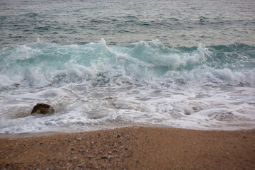 sea waves in the adriatic sea and the beach