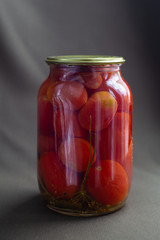 canned tomatoes in a glass jar