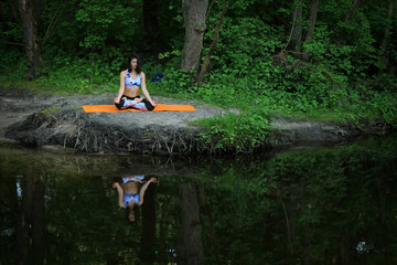 Yoga position in the forest 