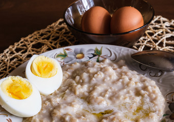 morning breakfast kitchen fresh natural food oatmeal and boiled egg