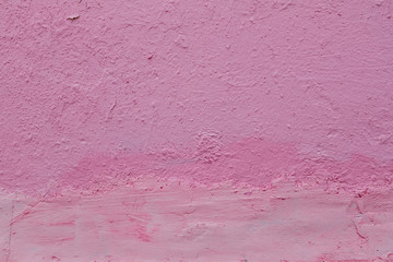 Wall is covered with fresh pink paint