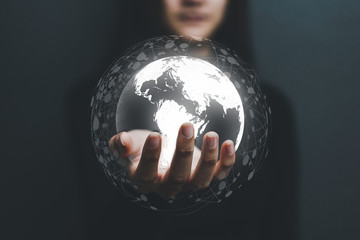 Communication technology and internet worldwide for business concept.Woman hand holding Business World.