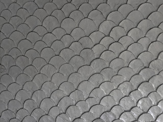 Gray fish scale mortar plaster pattern of wallpaper vintage 