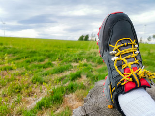 view of colorful trekking boots in nature