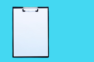 Clipboards with blank white paper sheet on blue background.