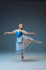 Weightless. Young and graceful female ballet dancer as Cindrella fairytail character on studio background. Art, motion, action, flexibility, inspiration concept. Flexible ballerina in inspired dancing