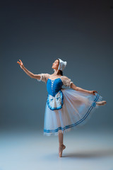 Weightless. Young and graceful female ballet dancer as Cindrella fairytail character on studio background. Art, motion, action, flexibility, inspiration concept. Flexible ballerina in inspired dancing