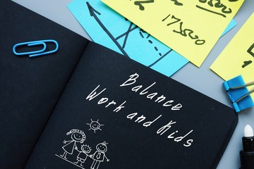 Business concept about Balance Work and Kids with inscription on the sheet.