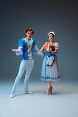Modern Cinderella with popcorn bucket and astonished Prince. Working out with dumbbells. Young and...