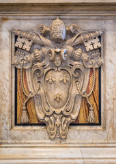 Pope Urban VIII coat of arms in Saint Peters Basilica in Rome, Italy.