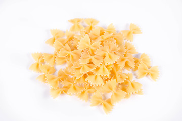 Raw Farfalle pasta on a white background