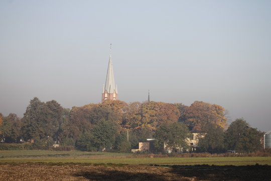Autumn village landscapes on misty morning
