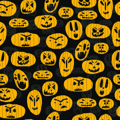 Seamless pattern with hand drawn pumpkins on dark backdrop. Stock vector illustration. Variation face expressions. Happy Halloween design for textile.