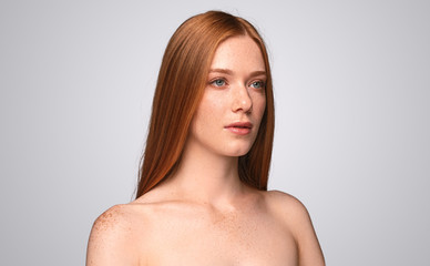 Young lady with freckles and red hair