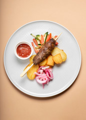 Long meatball dish prepared with a special presentation for dinner.