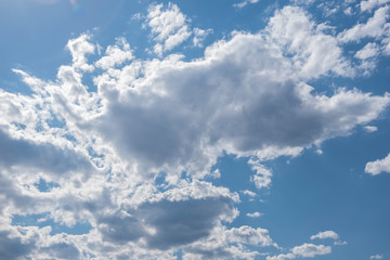 Obraz premium blue sky with clouds and sun