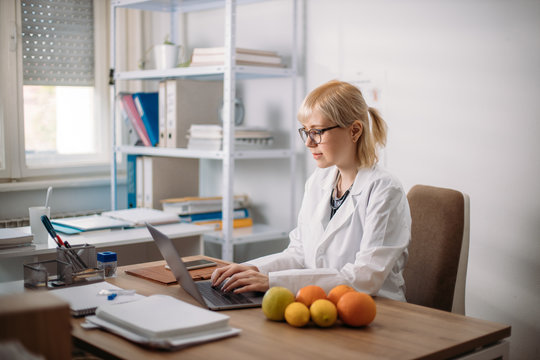 Female Dietitian Working In The Office