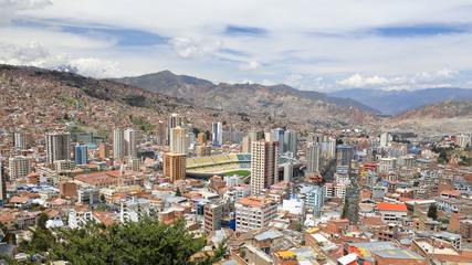 Fototapeta na wymiar The panoramic view of La Paz in Bolivia, with the highest located football stadium 3637 m asl