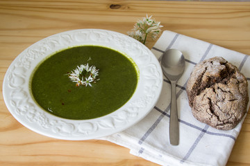 Wild Garlic and Stinging Nettle Soup Garnished with Wild Garlic Flowers and Served with Soda Bread