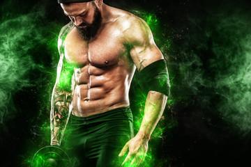 Athlete in green energy lights. Muscular young fitness sports man bodybuilder doing workout with dumbbell in fitness gym
