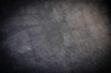 Obraz na płótnie Canvas Dark gray cattle skin texture with empty place for text top view, background for your text. Flat lay