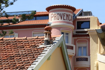 Red tile roof with a chimney. Provence, France, 2018-08-15