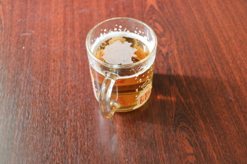 Beer in a mug on the table