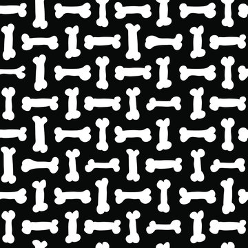 White bones on black background - seamless vector pattern of hand drawn doodle bones, halloween wrapping paper or dog's textile print